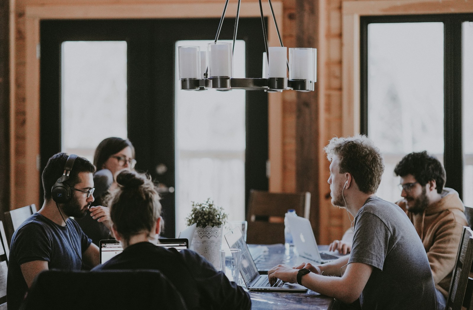 A small team working together around a table